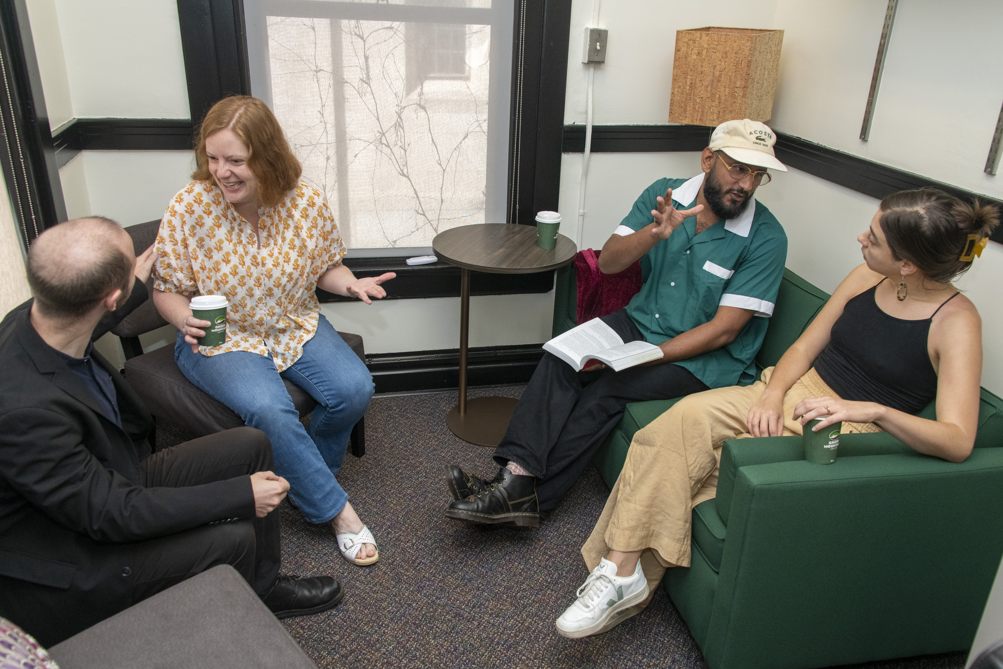 Graduate students having a discussion